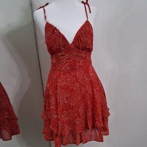 red mini dress with floral pattern